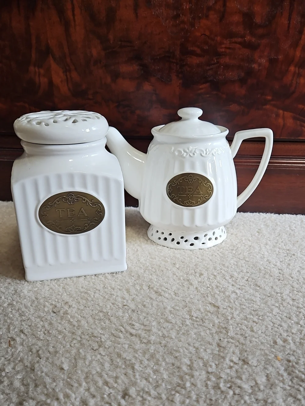 Elegant White Ceramic Tea Canister and Teapot Set with Brass Accents